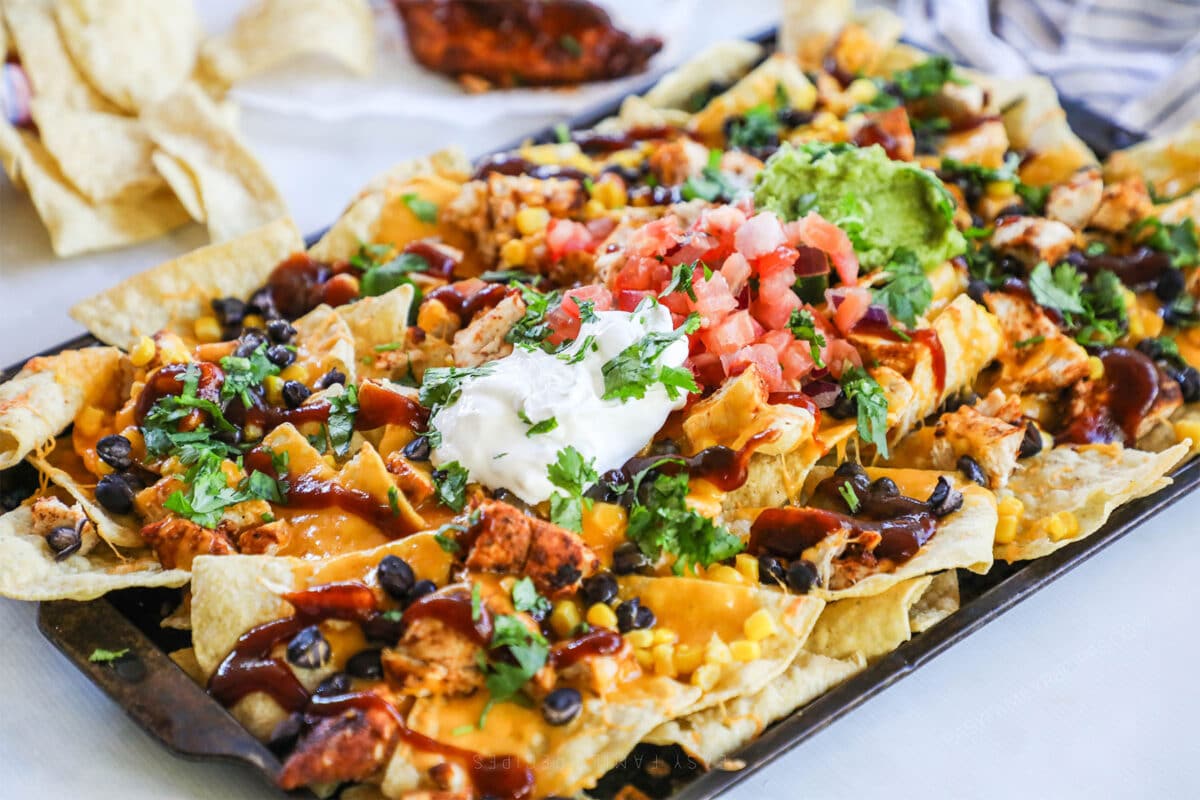 Secret to Perfect BBQ Chicken Nachos: Thighs, Lemon Pepper, & Layers